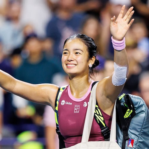 Alexandra Eala, of the Philippines, waves to the crowd after losing to Belinda Bencic, of Switzerland, in a round of 16 match at the National Bank Open tennis tournament in Toronto, on Sunday, Aug. 9, 2026. (Keito Newman/The Canadian Press via AP)