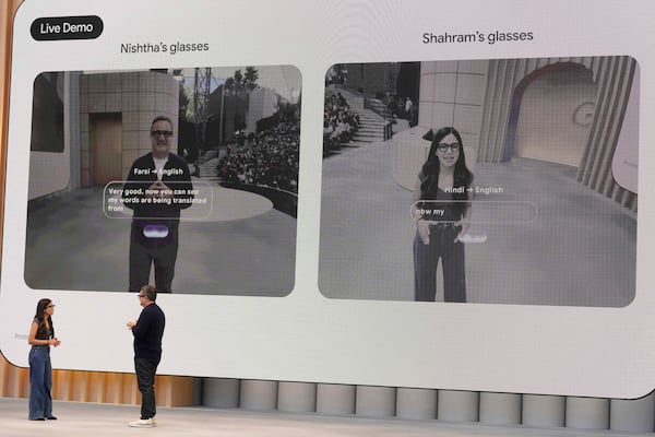 Nishtha Bhatia, Product Manager at Google, Glasses & AI, bottom left, and Shahram Izadi, Android XR Platform & Products, speak at a Google I/O event in Mountain View, Calif., Tuesday, May 20, 2025. (AP Photo/Jeff Chiu)