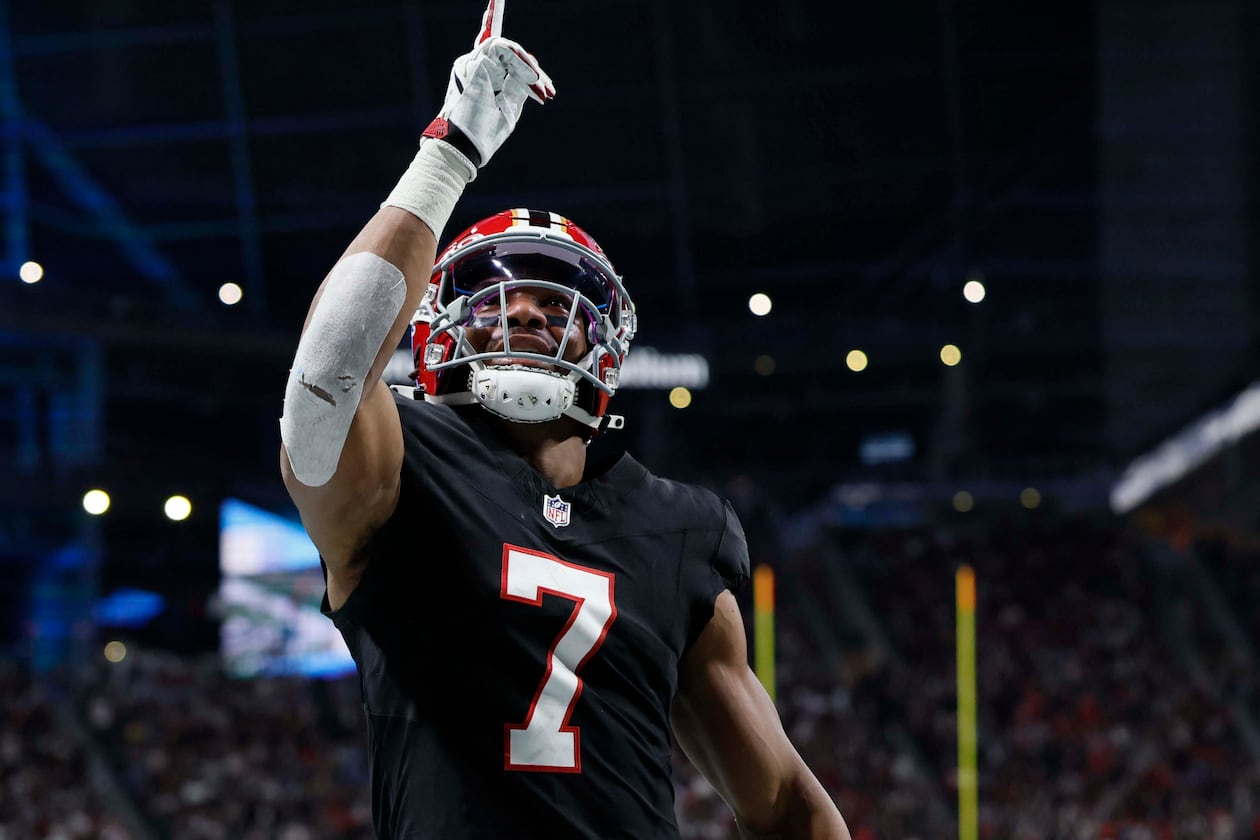 Falcons running back Bijan Robinson celebrates after scoring a touchdown against the Rams at Mercedes-Benz Stadium in Atlanta on Monday, Dec. 29, 2025. (Miguel Martinez / AJC)