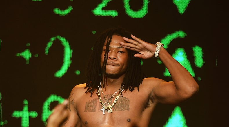 Rapper Ca$h Out performs during BET's 106 And Park 2013 New Years Eve Party at BET Studios on Dec. 17, 2012 in New York City. (Photo by Michael Loccisano/Getty Images)