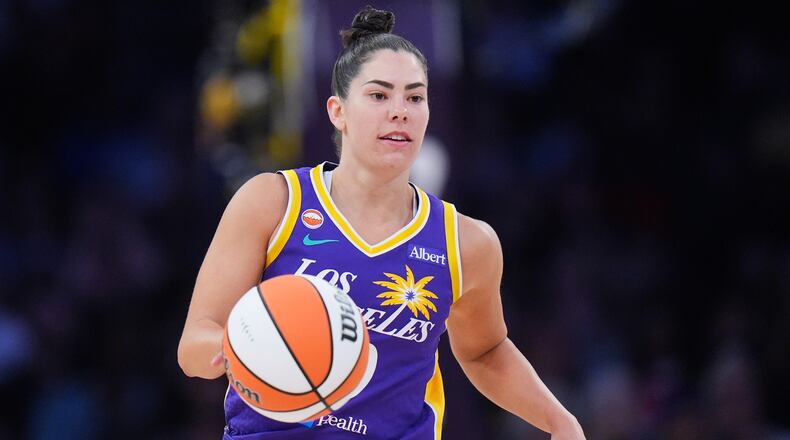 FILE - Los Angeles Sparks guard Kelsey Plum dribbles during the second half of a WNBA basketball game against the Indiana Fever, May 13, 2026, in Los Angeles. (AP Photo/Jae C. Hong, File)