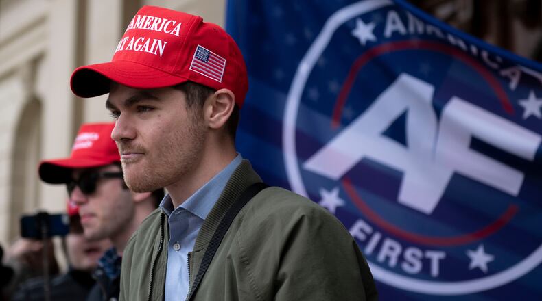 FILE - Nick Fuentes, far right activist, holds a rally at the Lansing Capitol, in Lansing, Mich., Wednesday, Nov. 11, 2020. (Nicole Hester/Mlive.com/Ann Arbor News via AP, File)