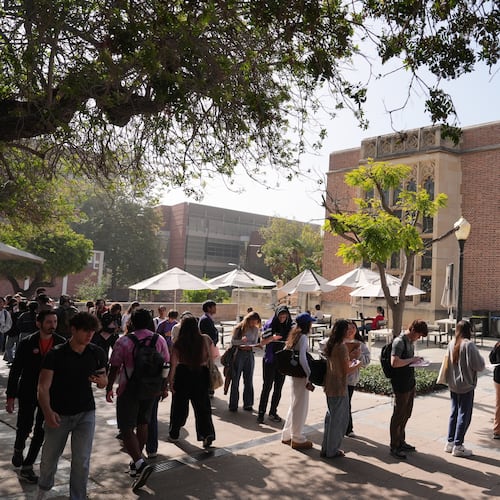 Voters form a line at a polling station on the UCLA campus Tuesday, Nov. 4, 2025, in Los Angeles. (AP Photo/Jae C. Hong)