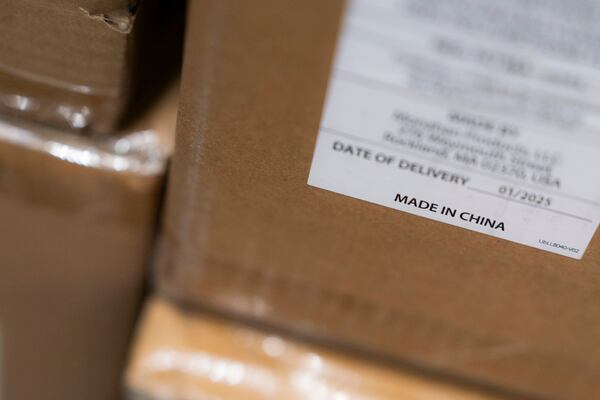 A "Made in China" sticker is seen on inventory at the baby store Three Littles Union Market location in Washington, on Wednesday, April 16, 2025. (AP Photo/Nathan Howard)