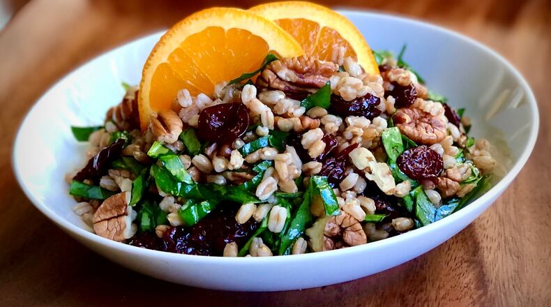 For some creative but lighter fare this holiday season, try Farro with Toasted Pecans and Dried Cherries. Courtesy of Megan McCarthy