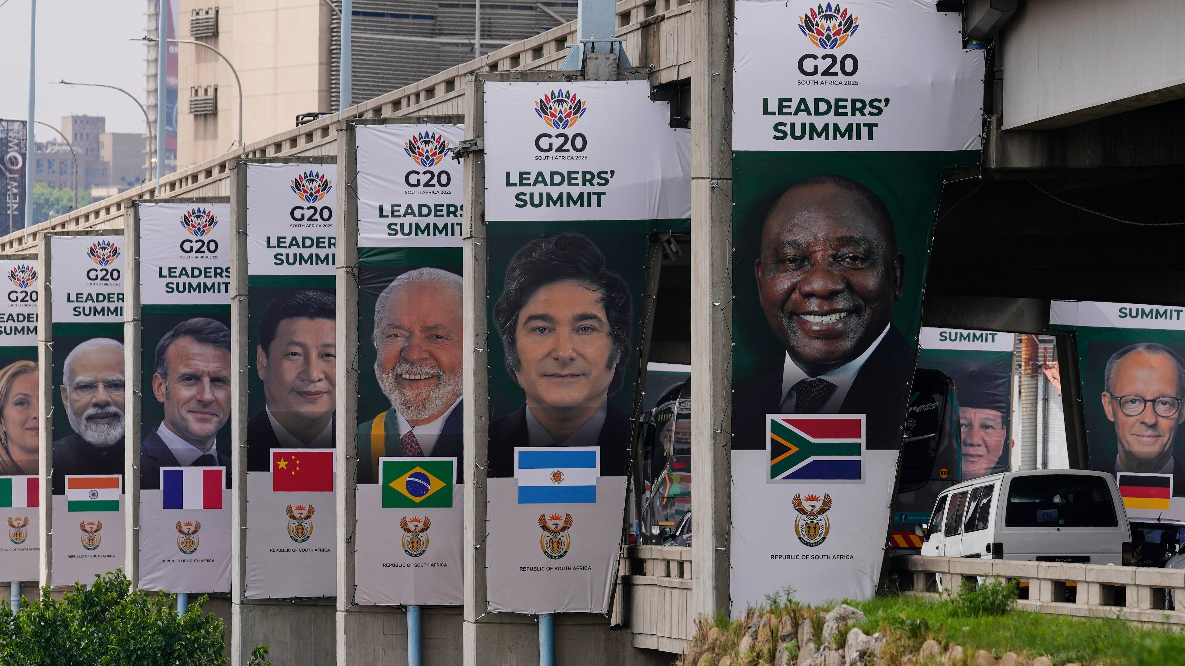 Banners of various G20 leaders are displayed along a Johannesburg freeway, in Johannesburg, South Africa, Thursday, Nov. 20, 2025. (AP Photo/Themba Hadebe)