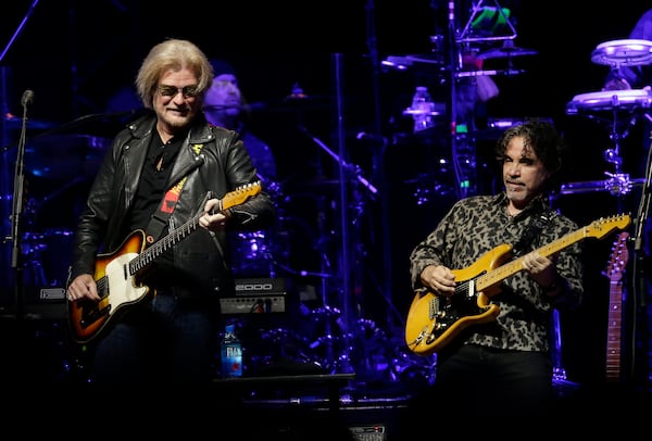 FILE - Daryl Hall, left, and John Oates perform in Glendale, Ariz. on July 17, 2017. (Photo by Rick Scuteri/Invision/AP, File)