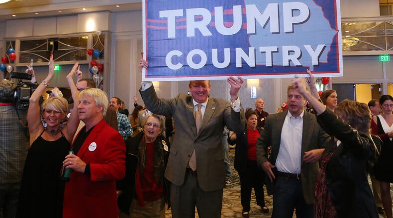 Republican voters celebrate as it is projected Trump wins Georgia at the Republican Watch party at the Grand Hyatt, Buckhead, on Tuesday, Nov. 8, 2016, in Atlanta. (Curtis Compton / ccompton@ajc.com)