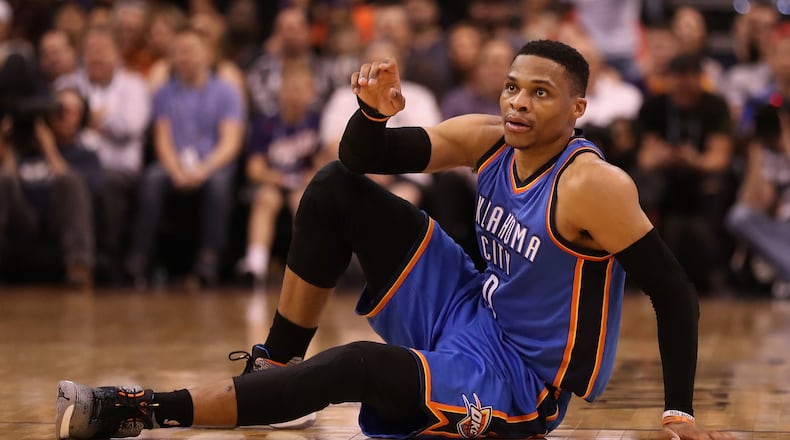 Russell Westbrook of the Oklahoma City Thunder tied a 55-year-old NBA record Friday night when he clinched a triple-double average for the season.
