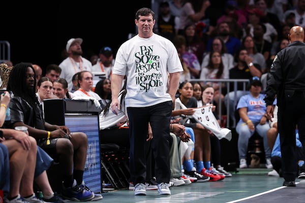 Atlanta Dream head coach Karl Smesko looks on during the first half of a WNBA basketball game against the Indiana Fever, Thursday, May, 22, 2025, in Atlanta. (AP Photo/Colin Hubbard)