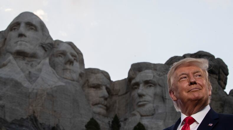 President Donald Trump smiles at Mount Rushmore National Memorial, Friday, July 3, 2020, near Keystone, S.D. (AP Photo/Alex Brandon)