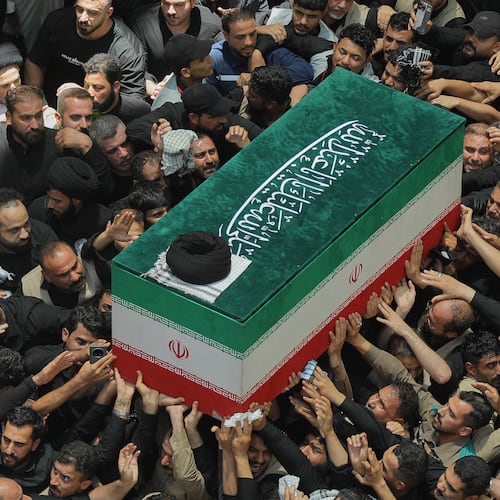 The coffin of the late Iranian Supreme Leader Ayatollah Ali Khamenei is carried by mourners to the Imam Ali Shrine in Najaf, Iraq, Wednesday, July 8, 2026. (AP Photo/Anmar Khalil)