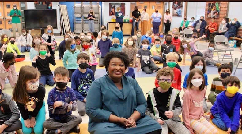 An image of Stacey Abrams with a group of students in Decatur that was in a now-deleted tweet.