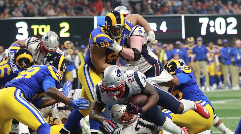 New England Patriots rookie running back Sony Michel (26) scores Super Bowl 53’s lone touchdown Sunday, Feb. 3, 2019, in the fourth quarter at Mercedes-Benz Stadium in Atlanta.