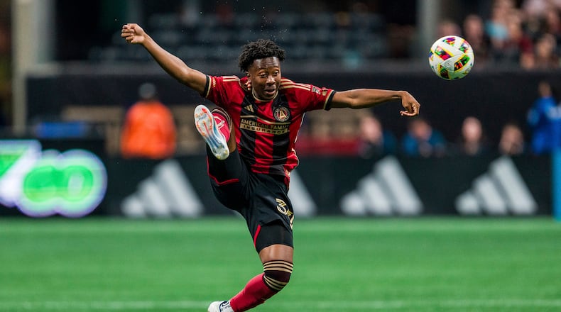 Atlanta United midfielder Jay Fortune passes the ball during the first half of an MLS soccer match against Toronto FC, Saturday, June 29, 2024, in Atlanta. (AP Photo/Danny Karnik)