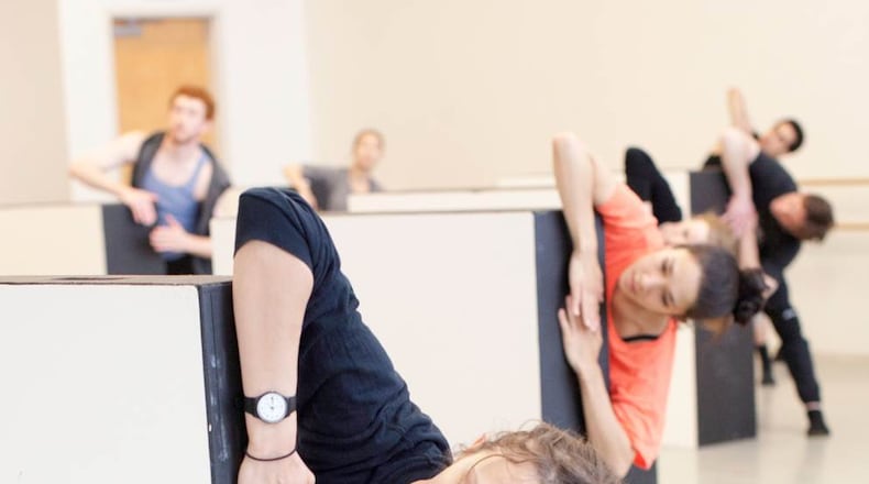 Ana Maria Lucaciu (front), who is staging “Cacti” for choreographer Alexander Ekman, rehearses with Atlanta Ballet dancers including Rachel Van Buskirk. CONTRIBUTED BY CHARLIE MCCULLERS