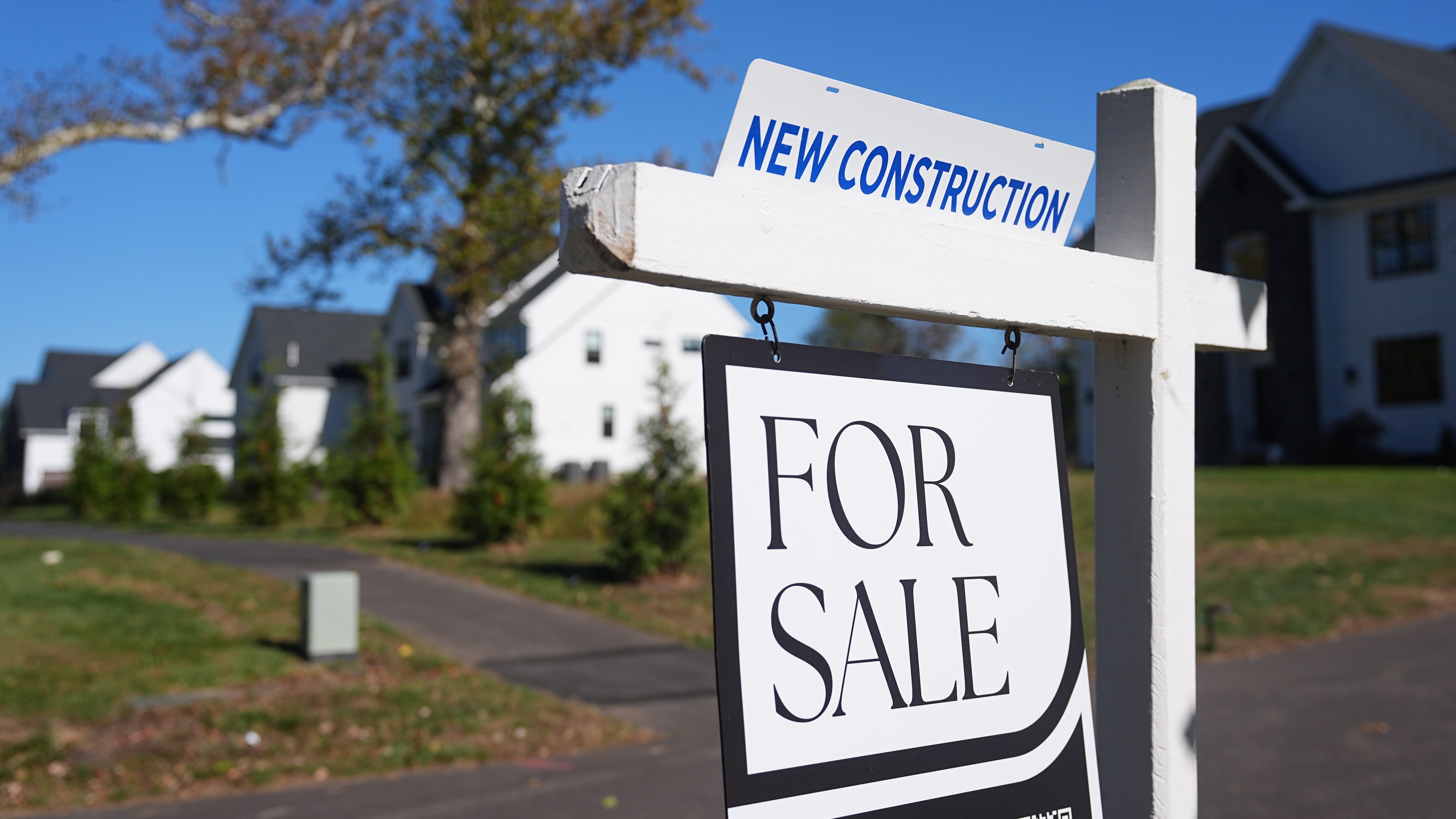 FILE - A sign is posted for a new home for sale in Ambler, Pa., Thursday, Oct. 16, 2025. (AP Photo/Matt Rourke, File)