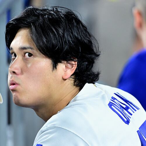 Los Angeles Dodgers Shohei Ohtani (17) watches from the dugout during the seventh inning of a baseball game against the Seattle Mariners, Tuesday, July 28 2026, in Los Angeles. (AP Photo/Wally Skalij)