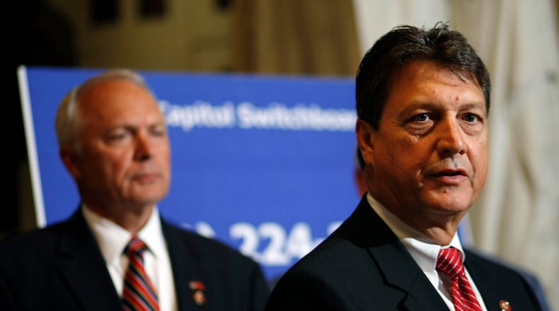 Rep. Lynn Westmoreland, R-Ga., right, during a news conference on Capitol Hill. (AP Photo/Pablo Martinez Monsivais)