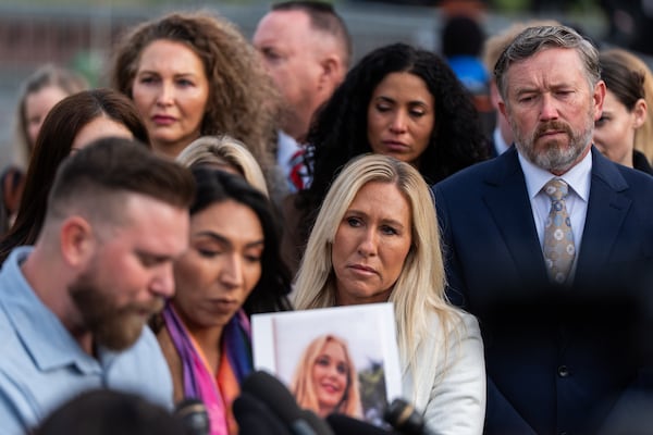 U.S. Rep. Marjorie Taylor Greene (second from right), R-Ga., and Rep. Thomas Massie, R-Ky. attend a news conference on the Epstein Files Transparency Act on Tuesday, Nov. 18, 2025, outside the U.S. Capitol in Washington. (Julia Demaree Nikhinson/AP)