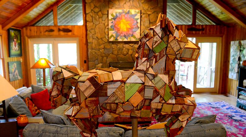 Homeowner and artist Sherry Cook reused wood architectural elements salvaged from old homes for this folk art sculpture of a horse. (