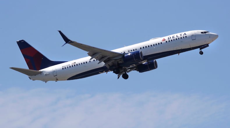 A Delta Air Lines passenger jet plane, a Boeing 737-900 model, approaches Logan Airport in Boston on May 24, 2018. (Charles Krupa/AP)