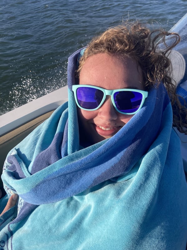 Abby Van Brimmer lost her cellphone while paddleboarding in August 2025. The device was recently recovered by a family visiting Ossabaw Island, about 20 miles from where it was lost (Adam Van Brimmer/AJC)