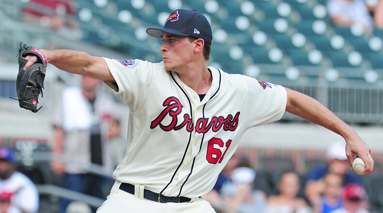 Max Fried of the Braves throws a ninth inning pitch against the Reds at SunTrust Park on August 20, 2017 in Atlanta, Georgia. (Photo by Scott Cunningham/Getty Images)