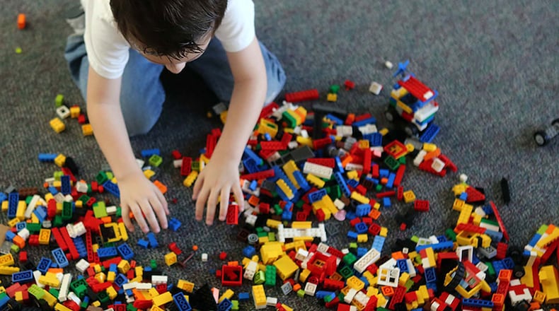 Ryan Radomski plays with Legos at the Family Place in Blake Library on February 7, 2013.