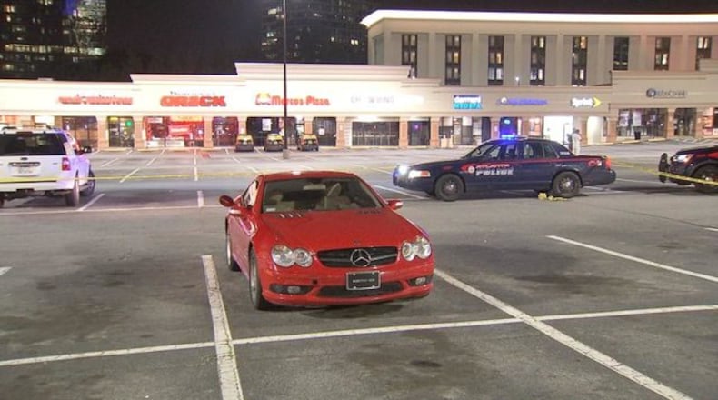 Police are investigating a deadly shooting outside a Buckhead shopping center. (Credit: Channel 2 Action News)