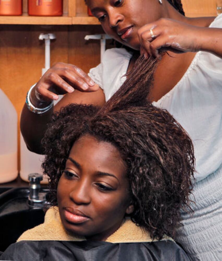 Salon straightens hair naturally