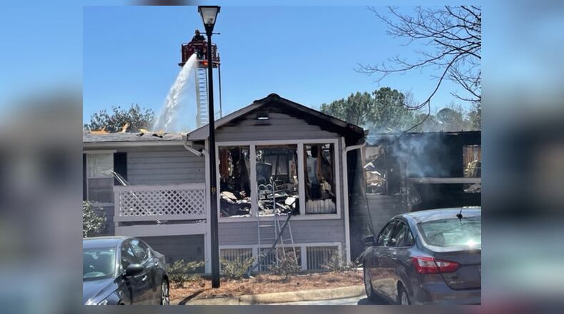 At least 30 people were displaced after a fire ravaged condos at the Dunwoody Hills complex along Vicksburg Place in Sandy Springs on Saturday, according to American Red Cross of Georgia officials.
