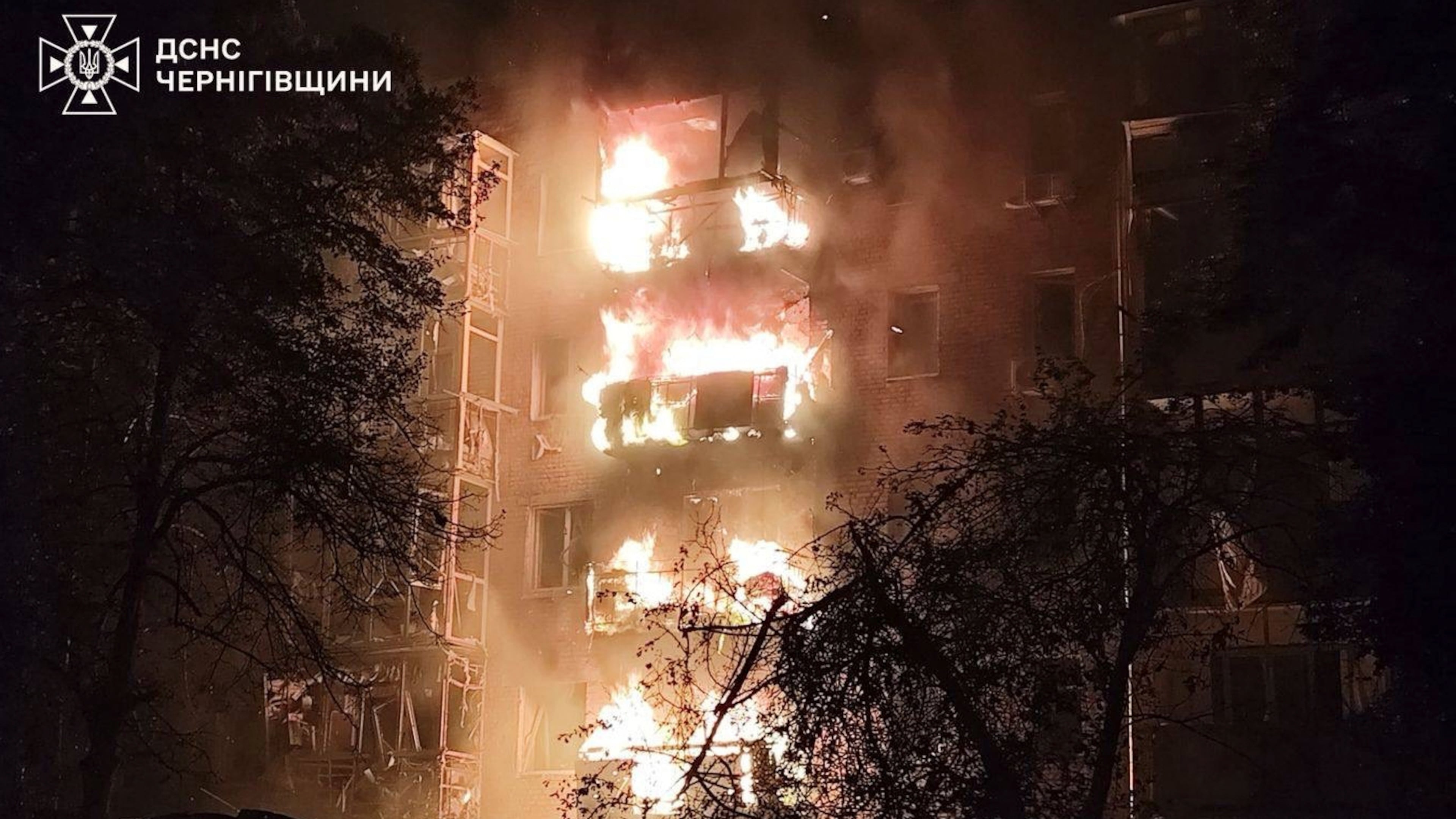 In this photo provided by the Ukrainian Emergency Services on Thursday, Oct. 16, 2025, a residential building is seen on fire after a Russian strike in Nizhyn, Chernihiv region, Ukraine. (Ukrainian Emergency Service via AP)
