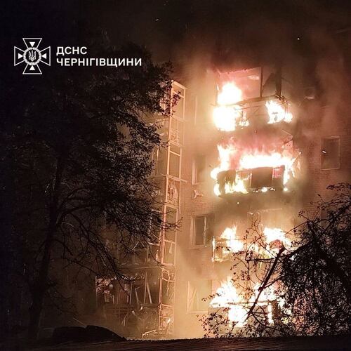 In this photo provided by the Ukrainian Emergency Services on Thursday, Oct. 16, 2025, a residential building is seen on fire after a Russian strike in Nizhyn, Chernihiv region, Ukraine. (Ukrainian Emergency Service via AP)