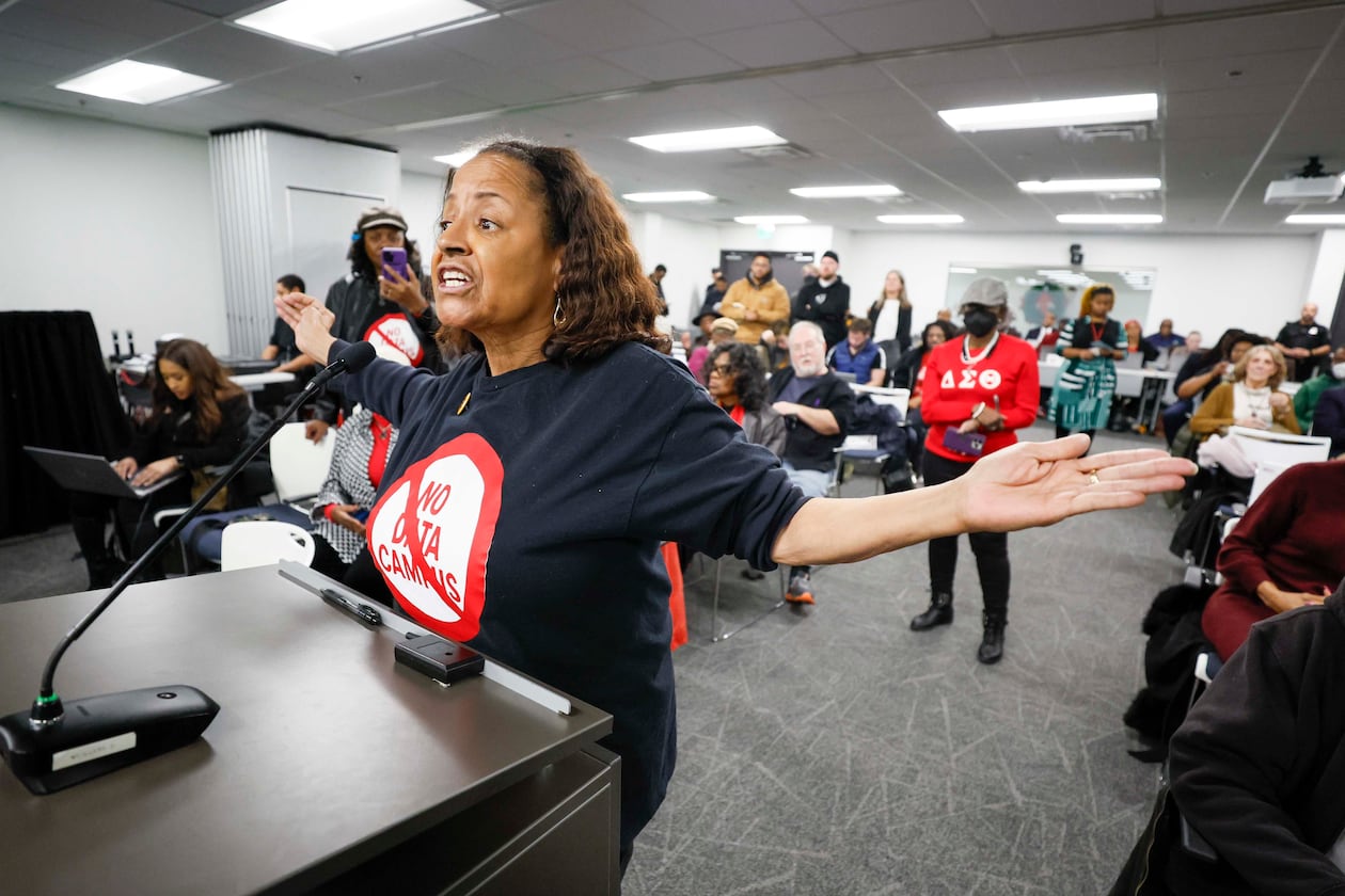 An opponent of data centers, Gina Mangham, shares her concerns during public comment at the DeKalb Board of Commissioners meeting in Decatur on Tuesday, Dec. 16, 2025. (Miguel Martinez/AJC)