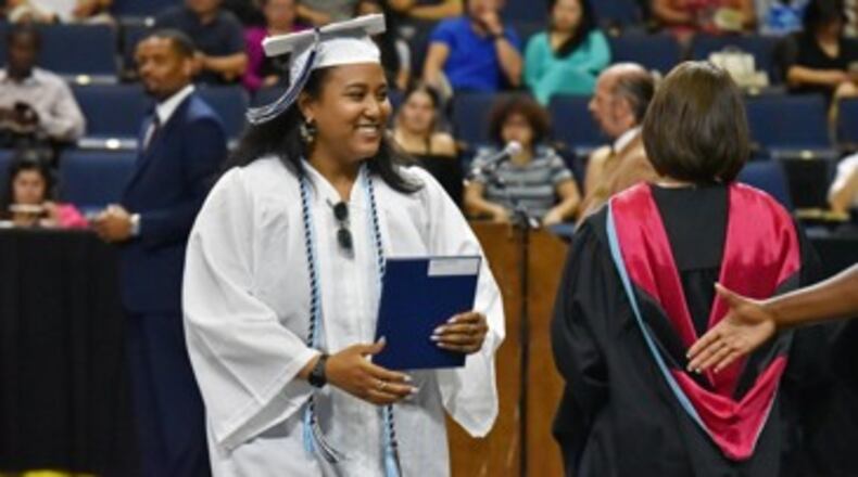 Last year's summer graduation was the last in-person ceremony for Gwinnett County Public Schools. The district recently released a schedule for virtual graduations this month. AJC file photo