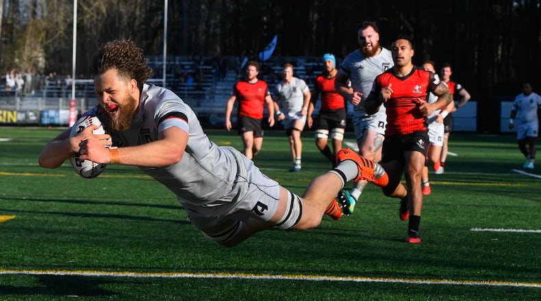Rugby ATL kicked off its inaugural game in the three-year-old Major League Rugby at Rugby ATL Stadium at Lupo Family Field in Marietta, Sunday, Feb. 9, 2020. Here Marno Redelinghuys dives to score the third try against Utah. (John Amis)