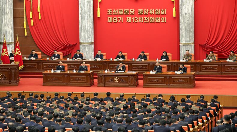 In this photo provided by the North Korean government, North Korean leader Kim Jong Un, center, attends a plenary meeting of the Workers Party's Central Committee in North Korea, Tuesday, Dec. 9, 2025. Independent journalists were not given access to cover the event depicted in this image distributed by the North Korean government. The content of this image is as provided and cannot be independently verified. Korean language watermark on image as provided by source reads: "KCNA" which is the abbreviation for Korean Central News Agency. (Korean Central News Agency/Korea News Service via AP)