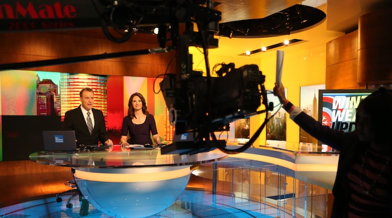 Mike Bettes and Maria LaRosa preside over the Weather Channel on January 28, 2014.