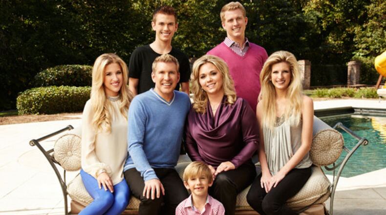 Todd Chrisley's family from season one, including Kyle (top right). CREDIT: USA