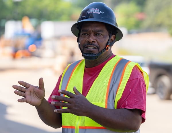 Gregory Williamson raised his family in one of the Bowen Homes apartments from the late 1980s to early 2000s. Now, he is among the hundreds of construction workers and contractors redeveloping the former public housing site. (Ben Hendren for the AJC)