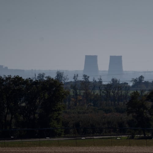 FILE - Zaporizhzhia nuclear power plant is seen from around twenty kilometers away in an area in the Dnipropetrovsk region, Ukraine, Monday, Oct. 17, 2022.  (AP Photo/Leo Correa, File)