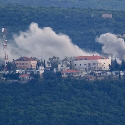 Smoke rises from Israeli artillery shelling on the village of Bayada as it is seen from Tyre city, south Lebanon, Thursday, March 26, 2026. (AP Photo/Hussein Malla)