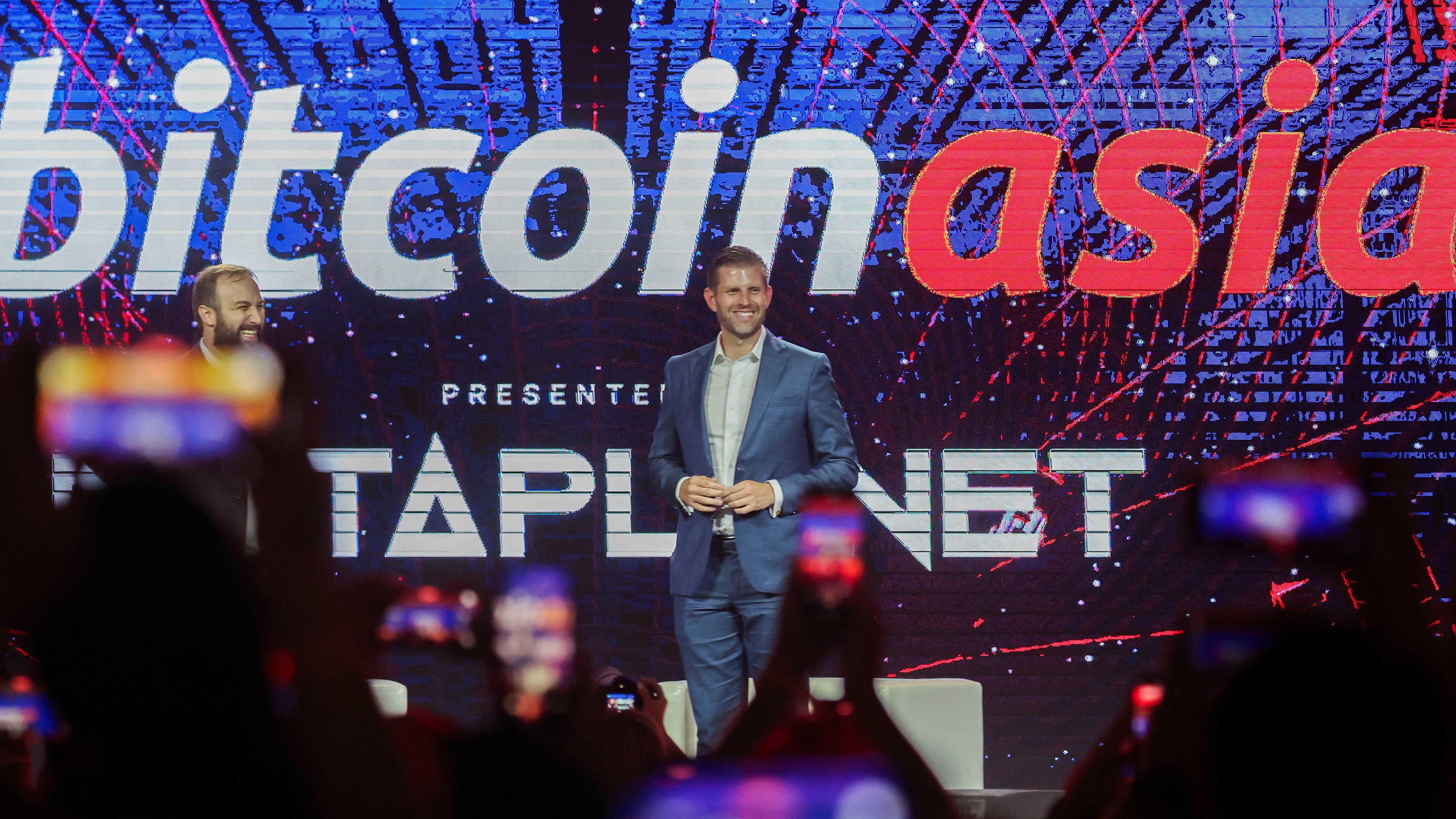 FILE - Eric Trump, Executive Vice President of the Trump Organization reacts during the Bitcoin Asia 2025, at the Hong Kong Exhibition Centre in Hong Kong, on Aug. 29, 2025. (AP Photo/Daniel Ceng, File)