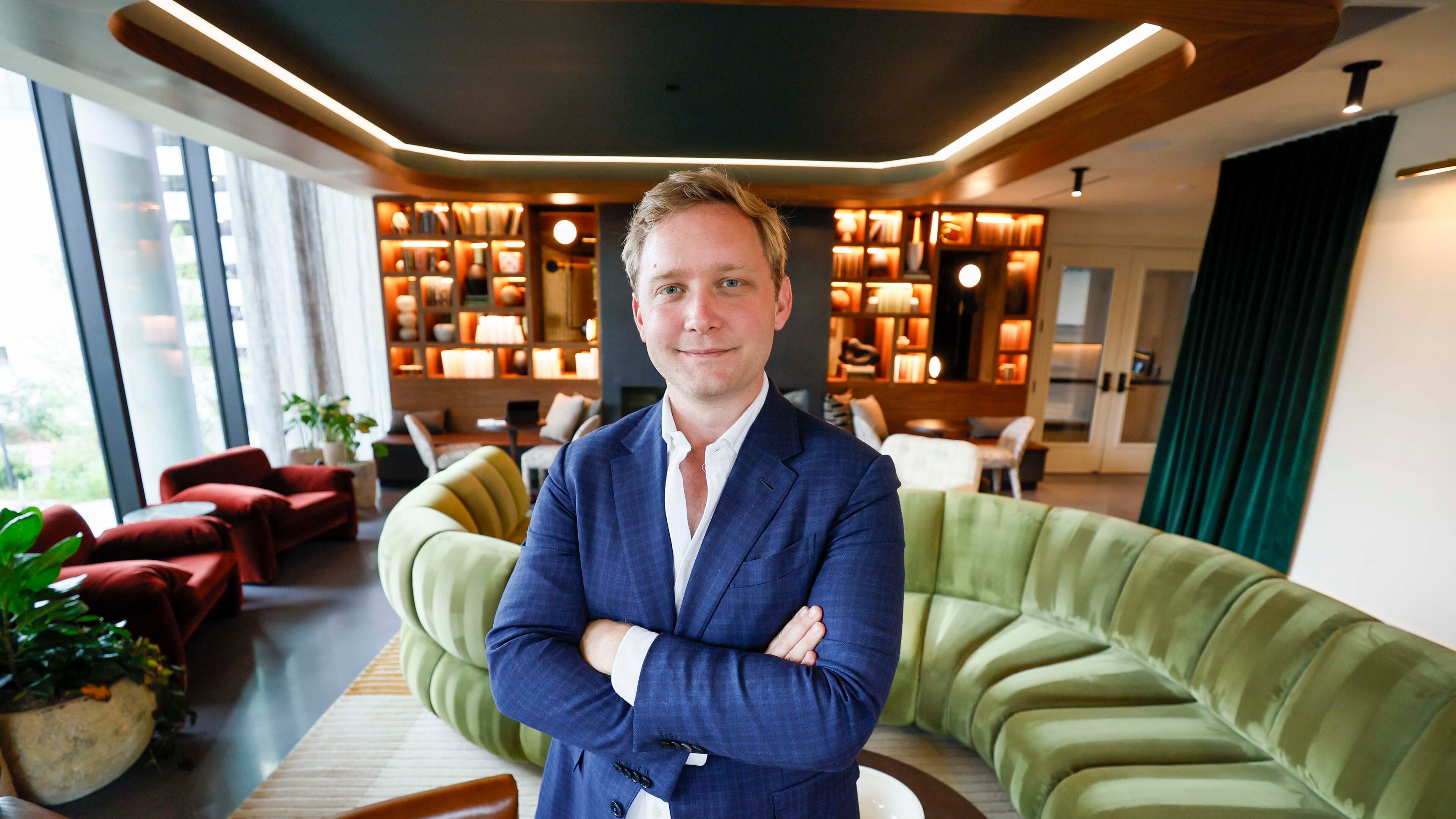 “We want to create a small neighborhood of just the coolest things,” Spencer Morris, president of Allen Morris Co., said. The latest project is Stella at Star Metals in West Midtown, where he's standing. (Miguel Martinez/ AJC)