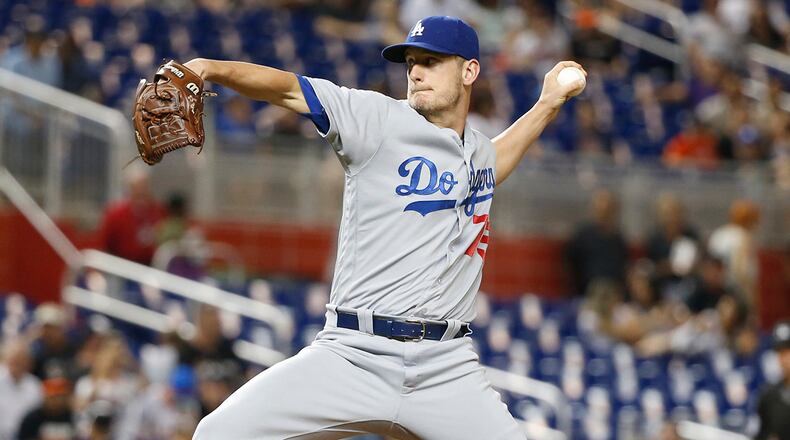 Los Angeles Dodgers relief pitcher Grant Dayton delivers a pitch during the ninth inning of a baseball game against the Miami Marlins, Saturday, Sept. 10, 2016, in Miami. The Dodgers defeated the Marlins 5-0. (AP Photo/Wilfredo Lee)