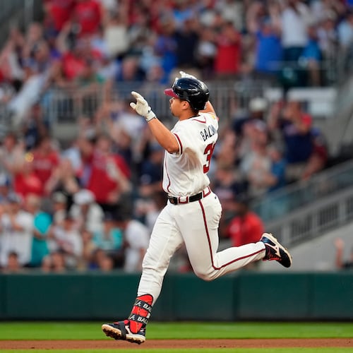 Atlanta Braves' Drake Baldwin celebrates his a solo homer in the fourth inning of a baseball game against the Chicago Cubs, Wednesday, May 13, 2026, in Atlanta. (AP Photo/Mike Stewart)