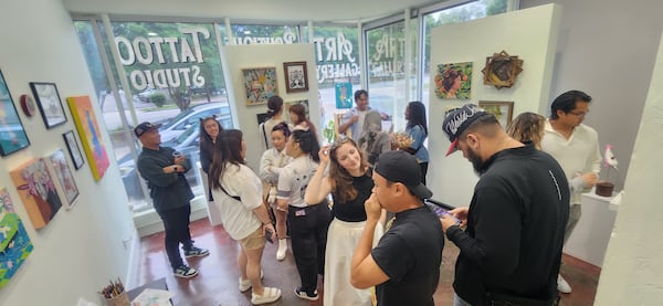 Exhibitions at Empire Arts Gallery draw crowds of art lovers, many of whom also frequent its tattoo studio. (Courtesy of Jessica Locklar)