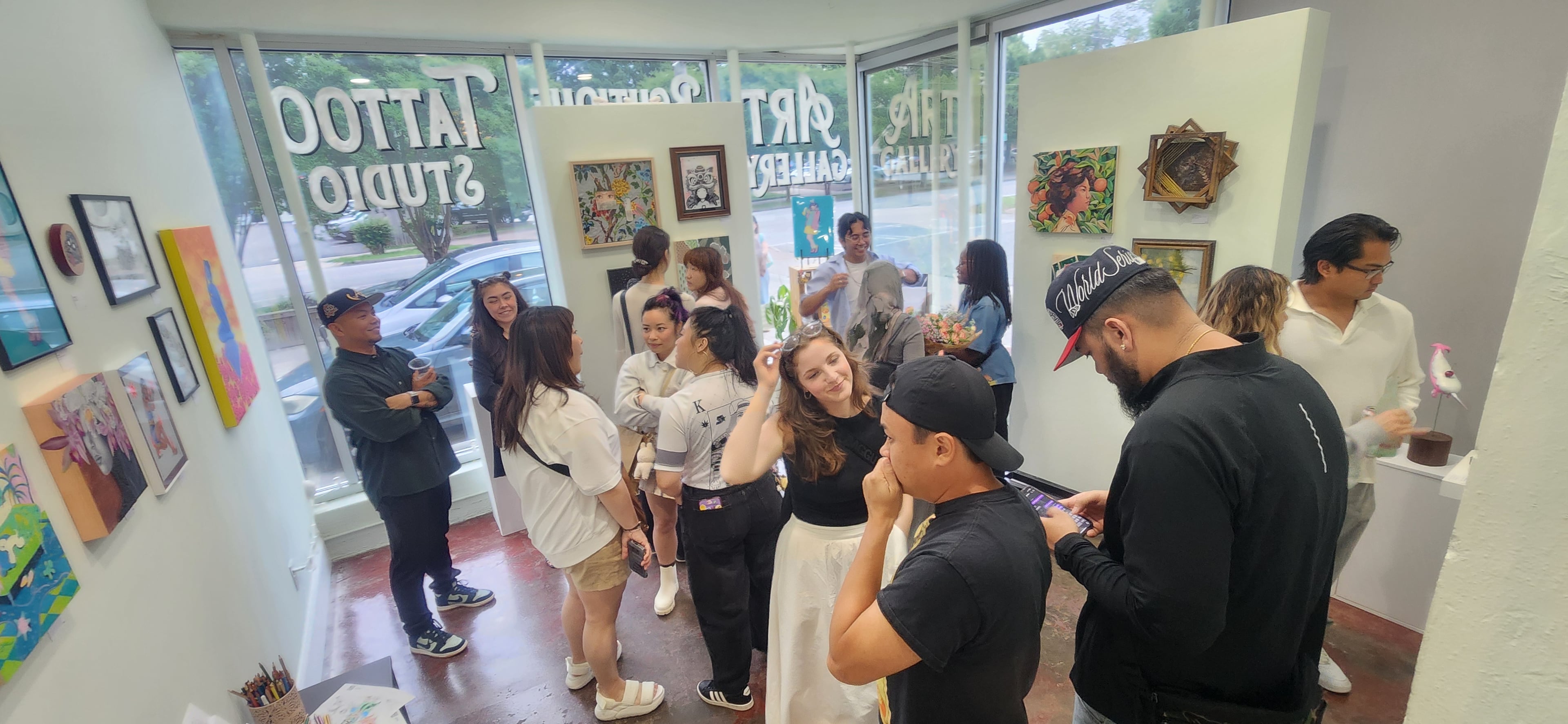 Exhibitions at Empire Arts Gallery draw crowds of art lovers, many of whom also frequent its tattoo studio. (Courtesy of Jessica Locklar)