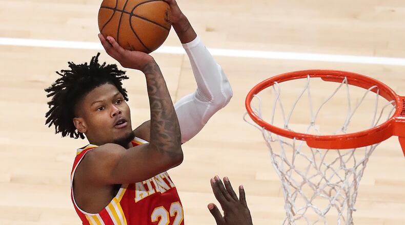 The Hawks' Cam Reddish shoots for two against the Brooklyn Nets on Jan. 27, 2021.    Curtis Compton / Curtis.Compton@ajc.com”